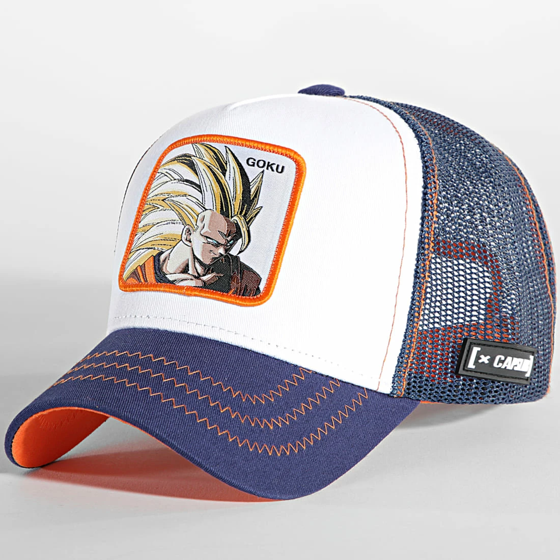 Remise ✨ Casquette Trucker Goku Bleu Marine Blanc de Capslab 🎉 1 Remise ✨ Casquette Trucker Goku Bleu Marine Blanc de Capslab 🎉